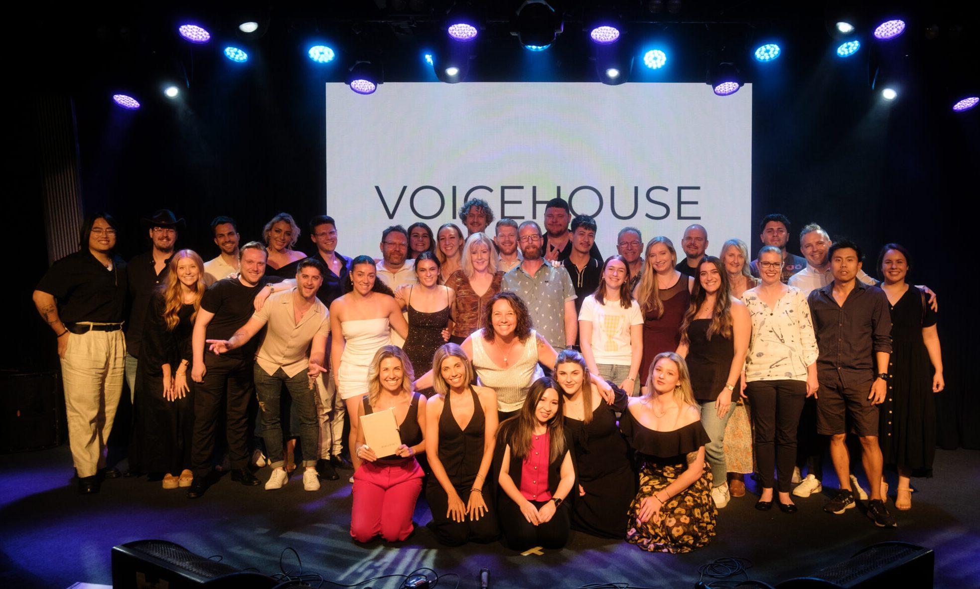 A large group of singers on stage